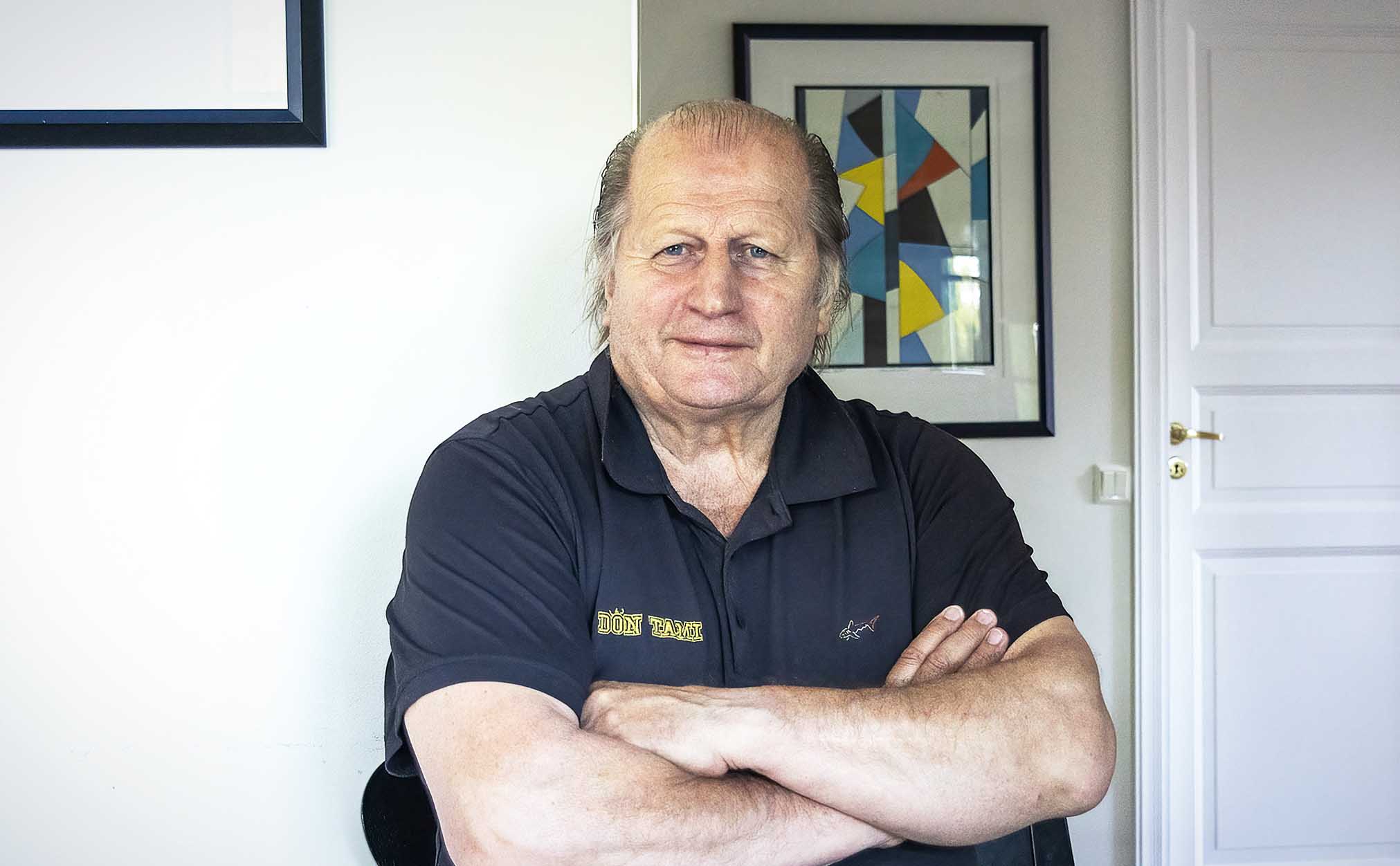 a man with his arms crossed